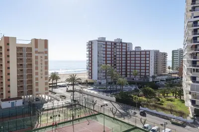 a view of a city with buildings and the beach at Florazar 1, I-A 7-B in Cullera
