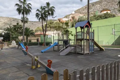 a playground with slides and a play structure at Florazar 2, Vi-10-B in Faro de Cullera