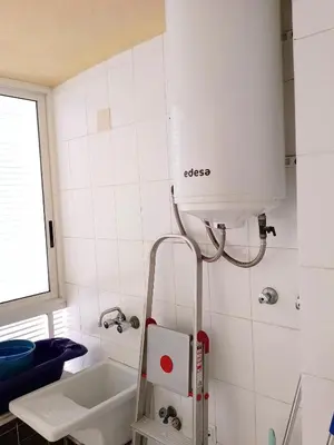 a small bathroom with a sink and a shower at Florazar 3, 3-C in Cullera