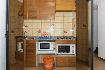 a kitchen with two microwaves and a microwave at Las Vegas, Esc-3, 7º-19 in Cullera