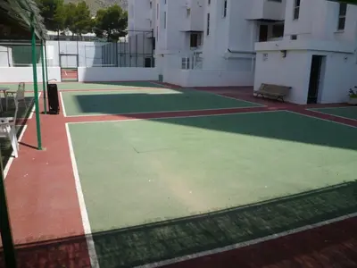 a tennis court on the side of a building at Las Vegas, Esc-3, 7º-19 in Cullera