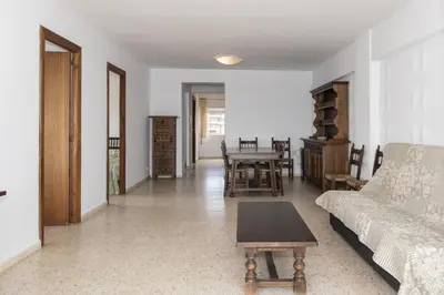 a living room with a couch and a table at Lider, 8-A in Cullera