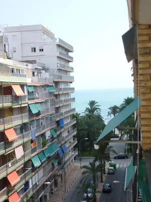 a view of the ocean from the balcony of a building at Nautic, 7º-O in Cullera