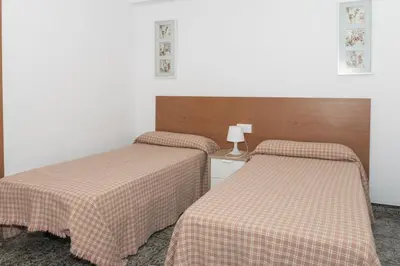two beds sitting next to each other in a room at Prado, A-7º-72 in Cullera