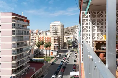 a view of a city street from a building at Saint Germain 7/B1, 8º-16 in Cullera