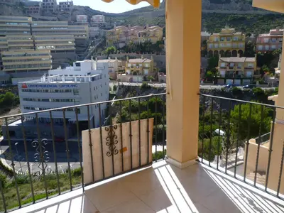 a balcony with a view of a city at Villas Cap Blanc Ii, Pta 11 in Cullera