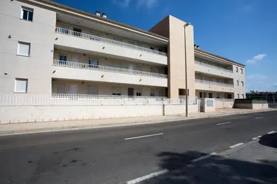 an empty street in front of a building at SingularStays Puzol Beach VI in Puzol