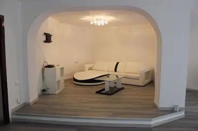 a room with a bed and a table in it at Apartment in Little Venice in Port Saplaya