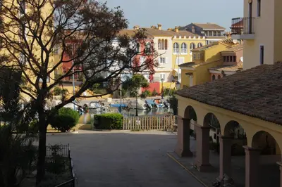 a view of a street in a city with buildings at Apartment in Little Venice in Port Saplaya