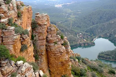 a view of a rocky mountain with a lake at Casa La Chelva in Alcudia de Veo