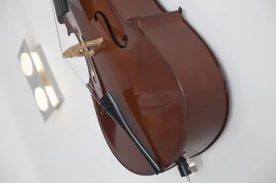 a brown suitcase is hanging on a wall at Hotel Valencia de la Música in Valencia