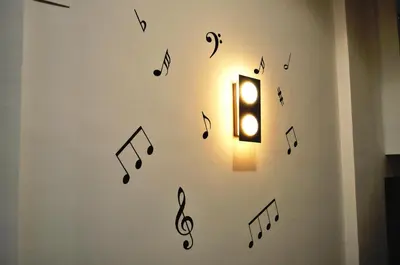 a wall with music notes on a wall at Hotel Valencia de la Música in Valencia