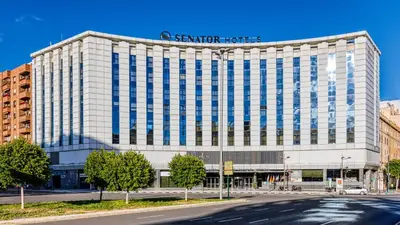 a building with a sign on the top of it at Senator Parque Central in Valencia