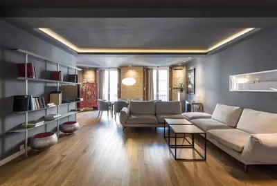 a living room with a couch and a table at Mon Suites San Martin in Valencia
