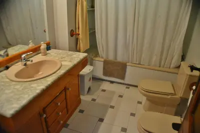 a bathroom with a sink and a toilet at Casa Las Violetas in Altura