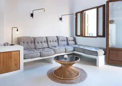 a living room with a couch and a table at Apartamentos La más Bonita in Valencia