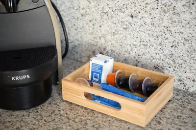 a wooden box with a bunch of tools on a counter at Sky Touristic Attic in Valencia