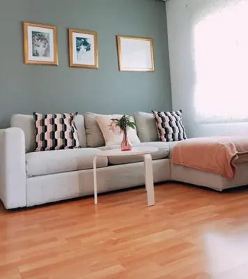 a living room with a couch and a table at Santos Studio 2 in Valencia