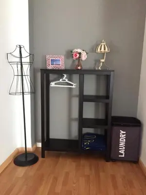 a black table with a shelf and a lamp at Santos Studio 2 in Valencia