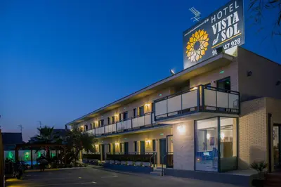 a hotel with a sign on the side of it at Hotel Vista al Sol in Paterna