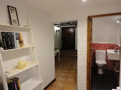 a bathroom with a toilet and a sink at Center Valencia in Valencia