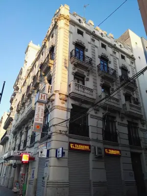 a tall white building on a city street at Balcón Al Mar in Valencia