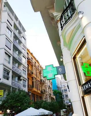 a street sign on the side of a building at Valencia Just in the Middle in Valencia