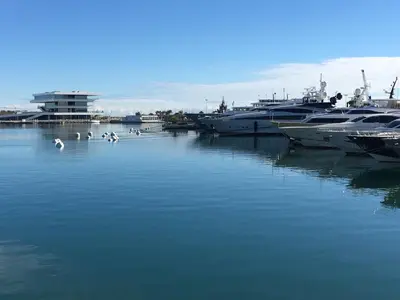 a group of boats are docked in a marina at City Center Atico 360 in Valencia