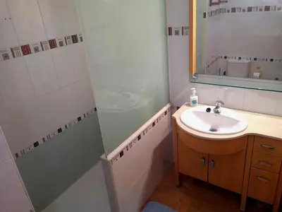 a bathroom with a sink and a mirror at City of Arts in Valencia