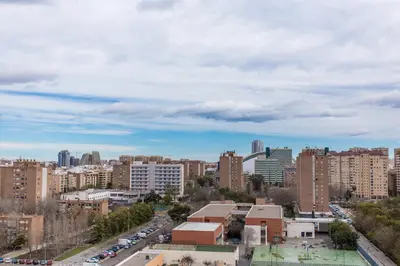 a cityscape of a city with tall buildings at Versus Apartments near City of Arts 2 in Valencia