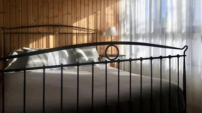 a bed in a room with a window at MD Modern Hotel - Jardines in Valencia