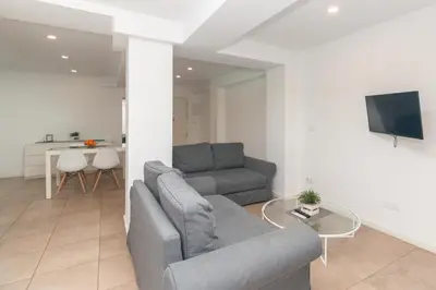a living room with a couch and a table at BET Apartments - Abastos in Valencia