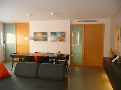 a living room with a couch and a table at Apartamento Forn dels Apòstols in Valencia