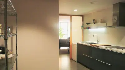 a kitchen with a sink and a counter top at Apartamento Forn dels Apòstols in Valencia