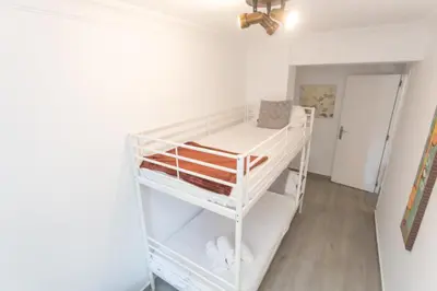 a bedroom with a bunk bed in a room at VLC - Cisneros in Valencia
