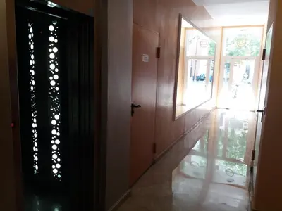 a hallway with a door and a window at Atico Duplex Luminoso in Valencia