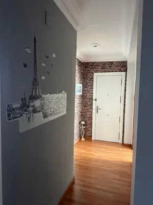 a drawing of the eiffel tower on a wall at Cristina Apartamento Center in Valencia