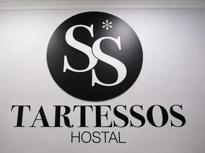 a logo for the ss tarsos hospital at Hostal Tartessos in Valencia