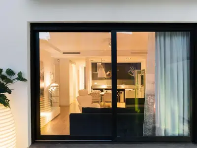 a living room with a view of a living room at Flat El Porto - Valencia in Valencia