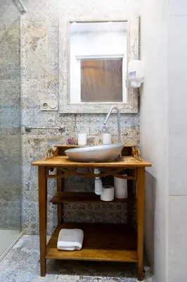 a bathroom with a sink and a mirror at Botanico Silence in Valencia