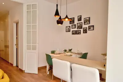 a dining room with a table and chairs at Hola Valencia - Holiday Apartments in Valencia