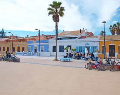 a group of bikes parked in front of a building at ApartUP Patacona Beach II in Valencia