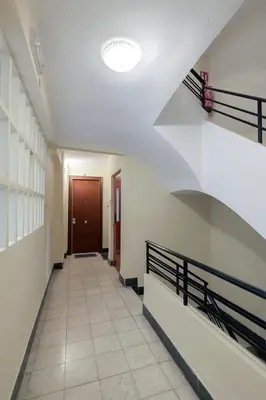 an empty hallway in a building with a door at Carmen Apartment in Valencia