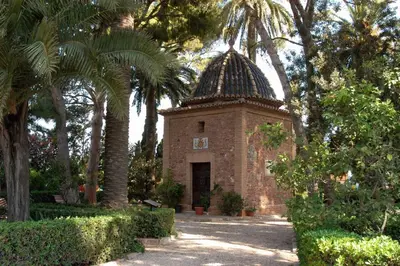 a brick building with a dome on top of it at Hotel Borja in El Puig