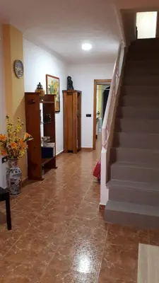 a hallway with a staircase in a house at Casa Pueblo Alzira No Compartida in Alzira