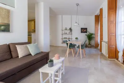 a living room with a couch and a table at Lovely Apartment! in Valencia