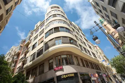 a tall building on a city street at SingularStays Santa Clara in Valencia