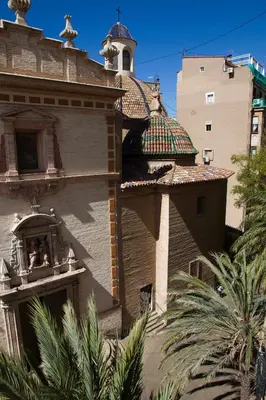 a building with a bell tower and a window at Russafa Youth Hostel in Valencia