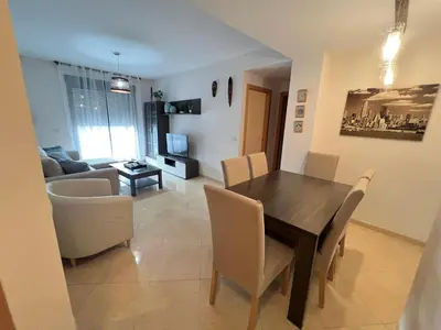 a small bathroom with a toilet and a shower at WONDERFUL APARTMENT IN CANET DE BERENGUER. VALENCIA in Valencia