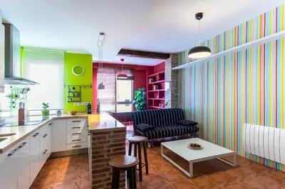 a kitchen with a couch and a table at Fun&Happy VLC Center in Valencia